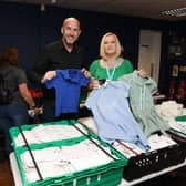 James Broughton, Town Centre Securities PLC and Tracy Morgan, Wear and Share Leeds, at the Leeds School Uniform Exchange
