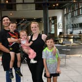 Owners Alan and Alison Tang with their children, Jude, Autumn and Gabriel.