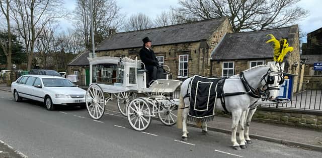 A timeless horse-drawn carriage provides a truly memorable farewell.