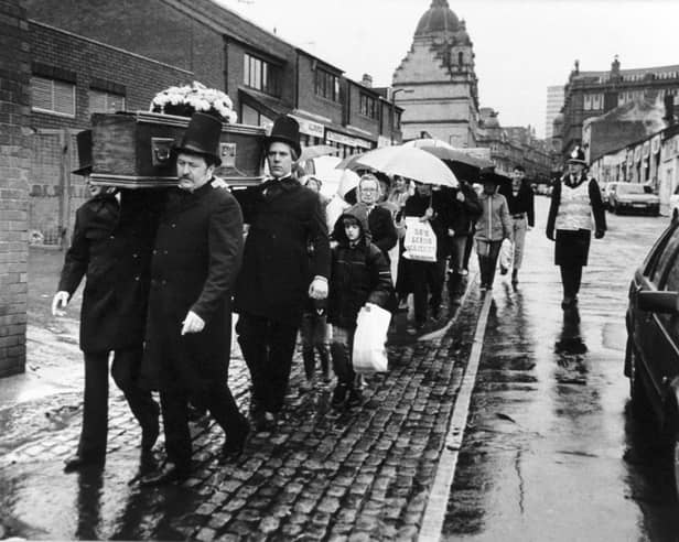 October 1986 and traders deliver a petition opposing council plans to redevelop Kirkgate Market.