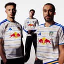 NEW HOME SHIRT: Modelled by Leeds United trio Ethan Ampadu, Joe Rodon and Dominic Calvert-Lewin.