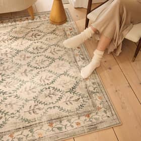The English Garden rug has a soft recycled-polyester surface and a distressed botanical design. Photo supplied by Hug Rug