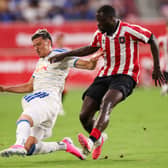 IMMEDIATE PRAISE: For Tarik Muharemovic, left, from Leeds United teammate Lukas Nmecha.