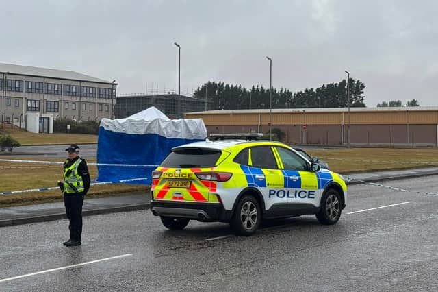 Police at the Elliot Industrial Estate in Arbroath where a nine-year-old girl was found seriously injured and later died after being taken to Ninewells Hospital in Dundee.