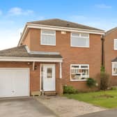 Positioned within a sought-after residential development, this detached home makes an inviting first impression with its smart exterior and family-friendly setting