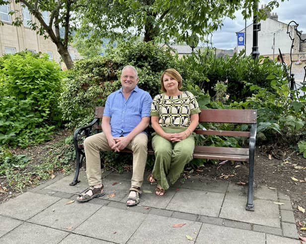 Councillor Paul Carter of Otley Town Council, and Janet Francis of Let’s Light Up Otley for Christmas at the "HSBC triangle"
