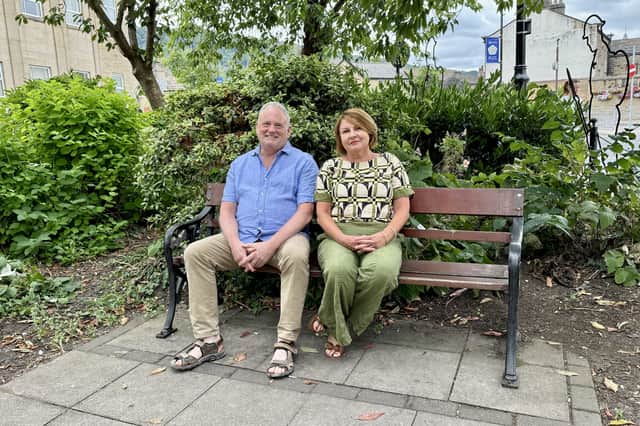 Councillor Paul Carter of Otley Town Council, and Janet Francis of Let’s Light Up Otley for Christmas at the "HSBC triangle"