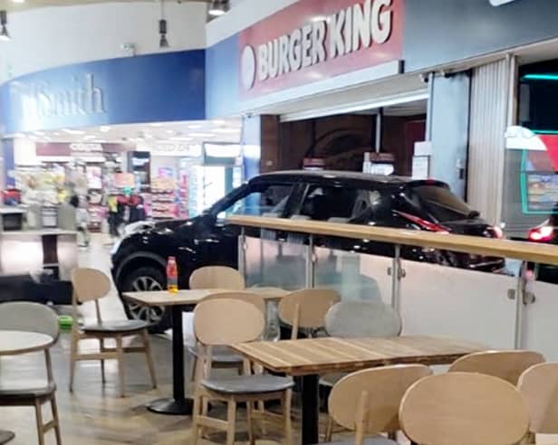 Dramatic footage captured the raid at Wetherby Services on July 29, 2026. Shocking footage reveals masked men raiding Wetherby Services after driving their car through the building.  