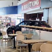 Dramatic footage captured the raid at Wetherby Services on July 29, 2026. Shocking footage reveals masked men raiding Wetherby Services after driving their car through the building.  
