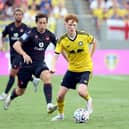 Callum Mills will hope to build on an impressive pre-season with the Leeds United first-team upon returning to the Under-21s.