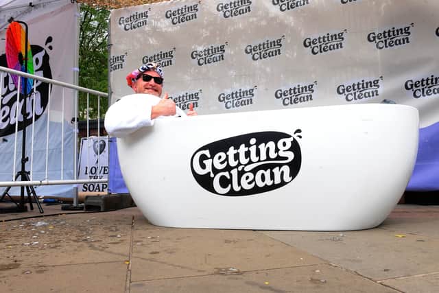 Chris Sylvester gives a thumbs-up from his branded bathtub in City Square as the 60-hour 'TUBTrap' fundraiser gets underway