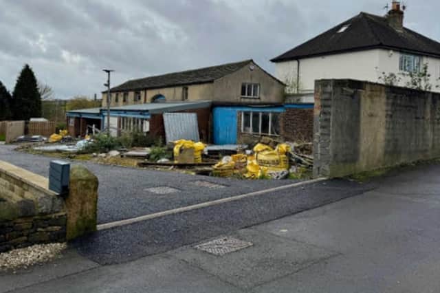 Plans to build homes on the site of a historic former coach house have been blocked by the city council.