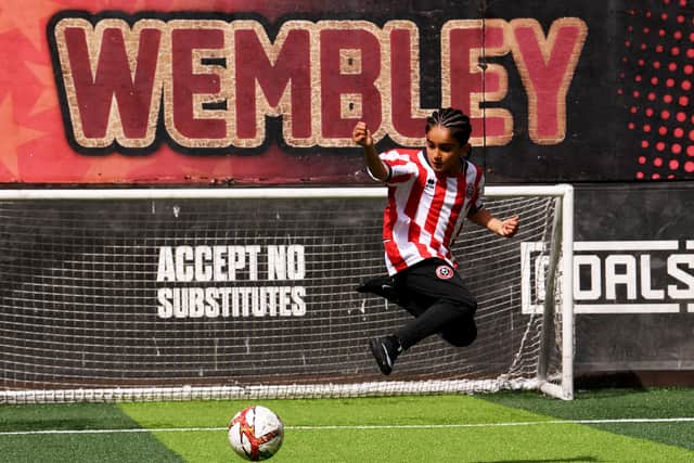 Eight-year-old Leeds footballer Rayaan Ronaldo - formerly of Manchester United Academy - who has signed for Sheffield United pictured at Goals Leeds.  Picture taken by Yorkshire Post Photographer Simon Hulme 9th June 2026
