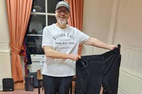 Richard WhItehead with the  54-inch trousers that once fitted him – today his waist is just 30 inches