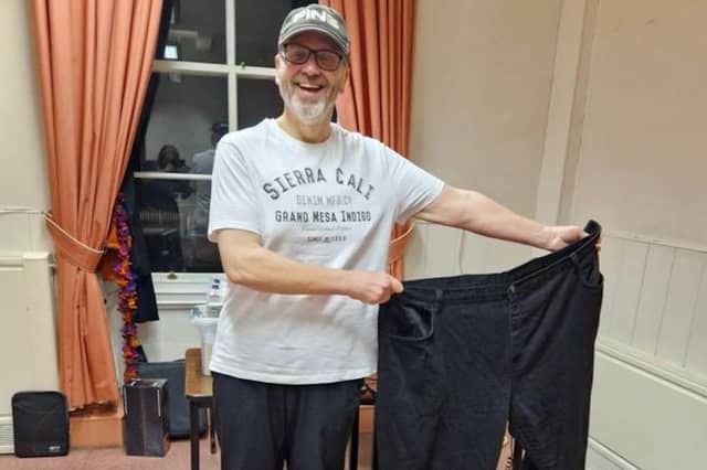 Richard WhItehead with the 54-inch trousers that once fitted him – today his waist is just 30 inches