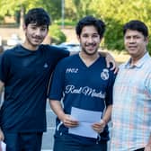 Abdullah Mahmood (centre) with his brother Roshaan and father, Sajid celebrating his A-level results 