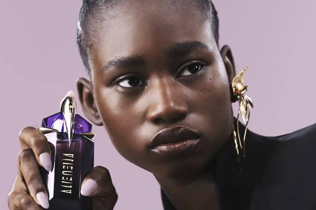 Mugler Alien Eau de Parfum combines radiant jasmine sambac with cashmere wood and white amber in a refillable amethyst-inspired bottle