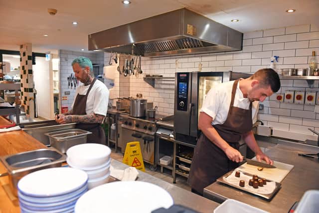 The team prepares for service.
