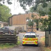 A police car near to the scene of a fatal dog attack in Wakefield. 