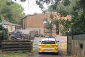 A police car near to the scene of a fatal dog attack in Wakefield. 