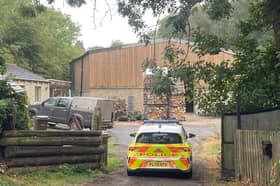 A police car near to the scene of a fatal dog attack in Wakefield. 