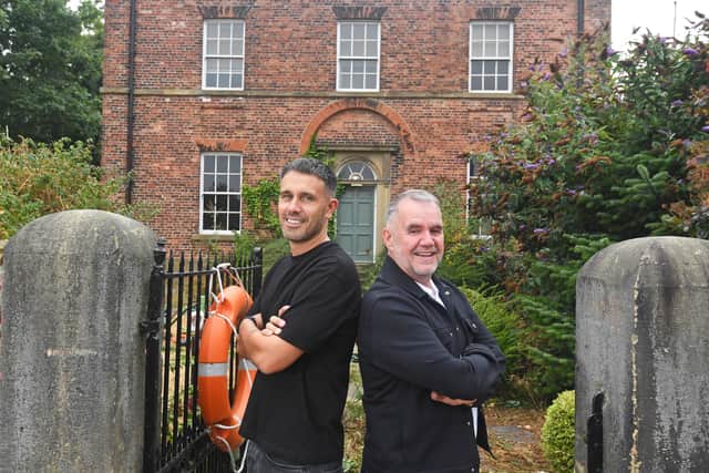 Pictured  the new custodians of Thwaite Mills Will Habergham and Terry George outside the mill house