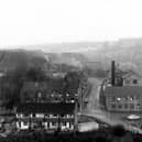 An elevated view of the junction of Pudsey Road, Wood Lane and Hough Tree Road. On the right is Boyes and Hallawell Ltd. woollen manufacturers in Hough End Mills. Pictured in December 1968.