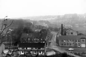 An elevated view of the junction of Pudsey Road, Wood Lane and Hough Tree Road. On the right is Boyes and Hallawell Ltd. woollen manufacturers in Hough End Mills. Pictured in December 1968.