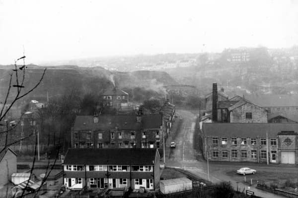 An elevated view of the junction of Pudsey Road, Wood Lane and Hough Tree Road. On the right is Boyes and Hallawell Ltd. woollen manufacturers in Hough End Mills. Pictured in December 1968.