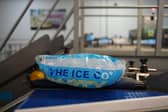 Bagged ice cubes on a conveyor belt at The Ice Co, in South Kirby. 