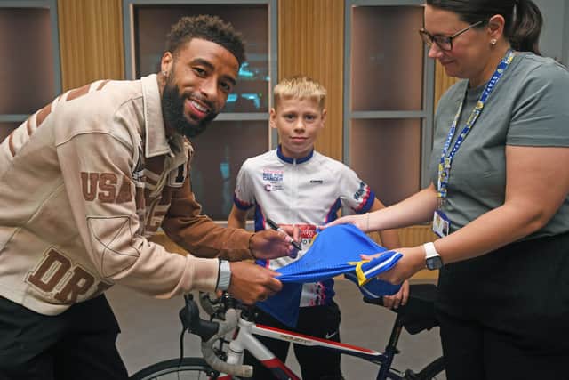 Charlie with Leeds United Player Jayden Bogle who signed a shirt for him on his visit to Elland Road