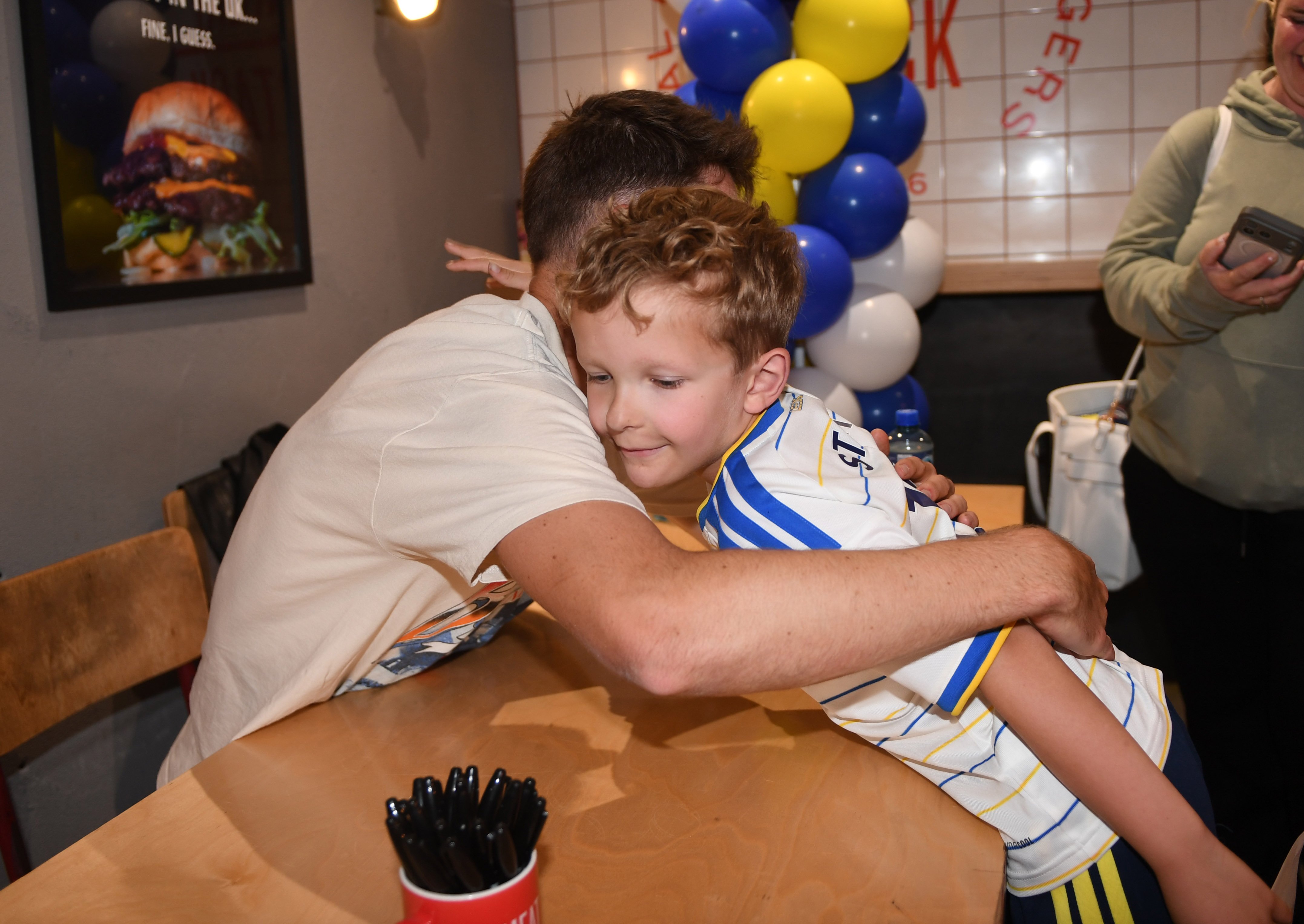 24 photos as Leeds United stars Ethan Ampadu and Tarik Muharemović surprise fans at Anton Stach burger launch