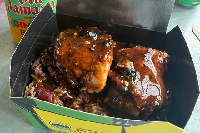 Jerk chicken, rice and peas and jerk gravy.
