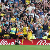 BEDLAM: In the away end as Leeds United's fans celebrate Anton Stach's late winner.