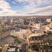 Aerial view of Bradford City Centre including Town Hall and Centenary Square.