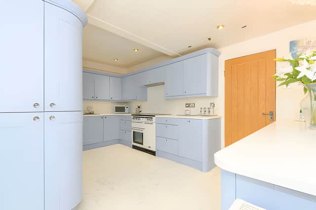 The home's kitchen offers space and style