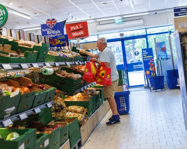 Customers shop in a Lidl store on 28 May 2026 in London, England.