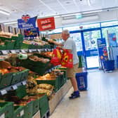 Customers shop in a Lidl store on 28 May 2026 in London, England.