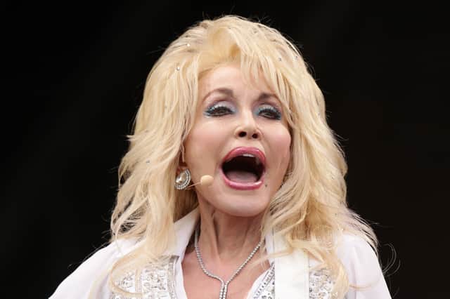 Dolly Parton performing on the Pyramid Stage at the Glastonbury Festival, at Worthy Farm in Somerset.