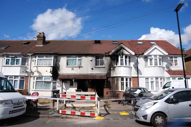 The scene outside a fire damaged property following the fire on Berkeley Avenue in Hounslow