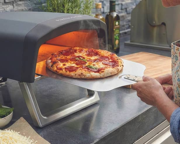 Get crisp, stone-baked bases and deliciously melted toppings in minutes with the Firebloom EP01 Electric Pizza Oven.