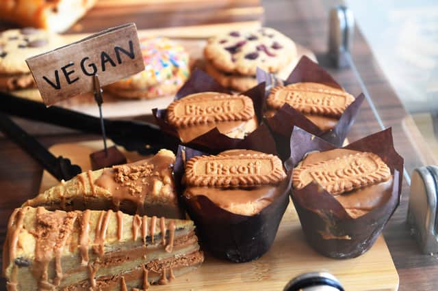 A counter full of fresh cakes