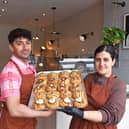Barista Adam Wells and founder Naila Khan with a selection of Crumbb cookies