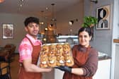 Barista Adam Wells and founder Naila Khan with a selection of Crumbb cookies