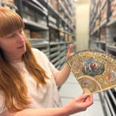 Natalie Raw, Leeds Museums and Galleries’ curator of costume, with a collection of fans.