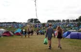 Festivalgoers at the campsite during the Leeds Festival at Bramham Park, Wetherby, West Yorkshire. Picture date: Friday, August 28, 2026.