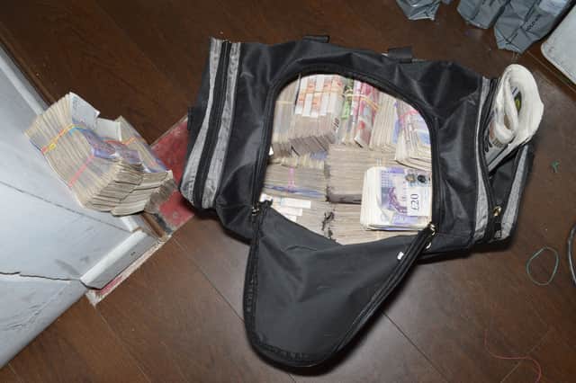 A holdall with cash recovered by police