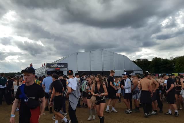 Crowds outside The Warehouse as stage is shut down