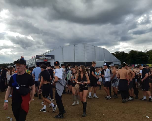 Crowds outside The Warehouse as stage is shut down