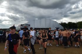 Crowds outside The Warehouse as stage is shut down